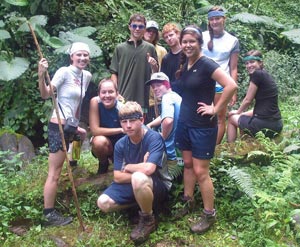 Student Hiking in Rain Gear