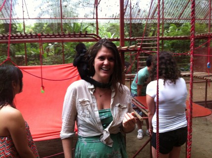 Allison goes into the monkey cage at the Jaguar Rescue Center.